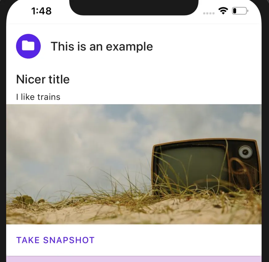 An iPhone simulator showing a React Native Paper card with a title, landscape image, and Take Snapshot button.